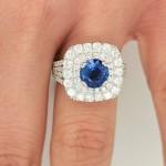 Round sapphire with pave diamond ring set